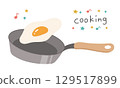 A cute illustration of a fried egg being cooked in a frying pan 129517899