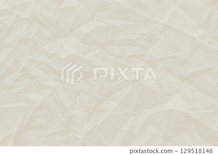 Crumpled textile, white surface for background. Cream color battered fabric, texture with copy space for text Crumpled textile, white surface for background. Cream color battered fabric, texture with copy space for text 129518146