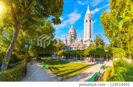 Basilica of the Sacred Heart in Montmartre, Paris, view on the bell tower side from the garden Basilica of the Sacred Heart in Montmartre, Paris, view on the bell tower side from the garden 129518401