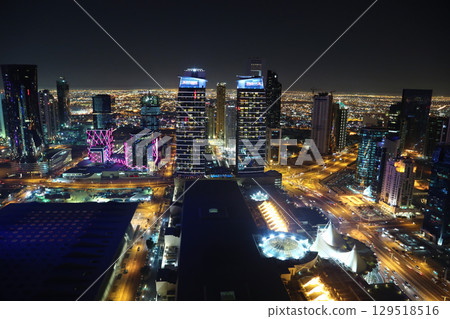 Night rooftop cityscape panorama of financial centre in Doha, Qatar Night rooftop cityscape panorama of financial centre in Doha, Qatar 129518516