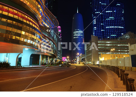 Night road traffic in financial centre, Doha, Qatar Night road traffic in financial centre, Doha, Qatar 129518524