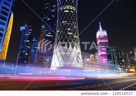 Night road traffic in financial centre in Doha, Qatar 129518527