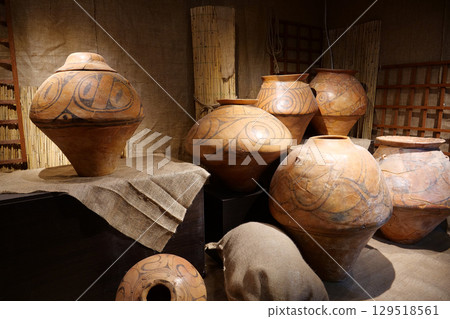 Real ancient pottery glued together from separate fragments 129518561