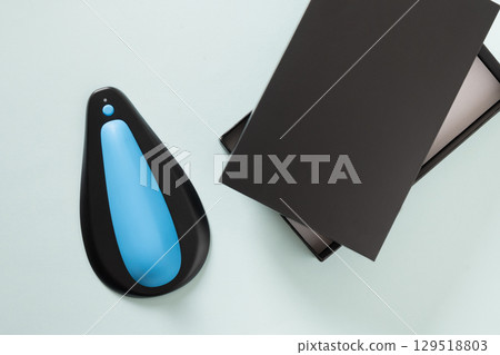 Kegel gymnastics with smart trainer and pelvic floor exercises and squeeze force control for men. Men's health concept. 129518803