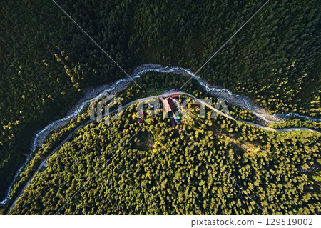 Top view of the landscape: mountain river and road in the gorge Top view of the landscape: mountain river and road in the gorge 129519002