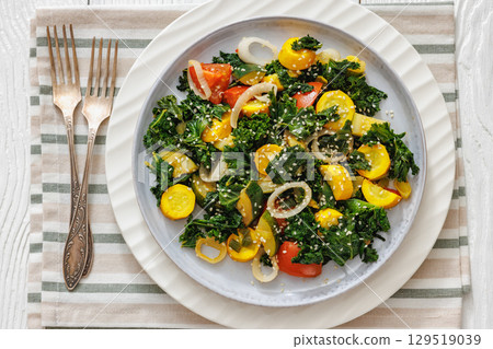 zucchini kale tomato saute sprinkled with sesame 129519039