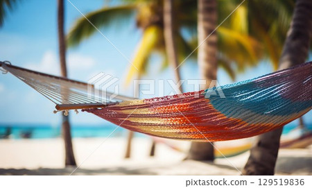 Tropical Relaxation: Hammock with Blurred Caribbean Beach Background. Generative ai 129519836