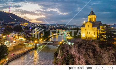 Downtown and old town of Tbilisi,  Metekhi  Church on hill over Kura river 129520273