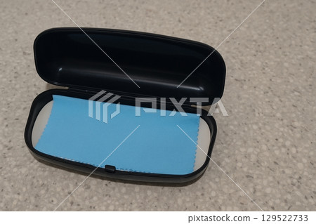 Black eyeglass case with lens cleaning cloth 129522733