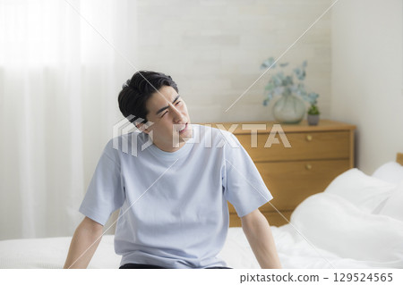 young man waking up young man waking up 129524565