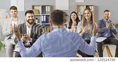 Providing professional IT and management training, man leading corporate meeting with colleagues Providing professional IT and management training, man leading corporate meeting with colleagues 129524790