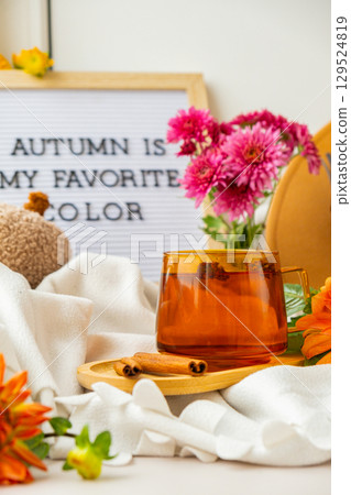 Letter board with text AUTUMN IS MY FAVORITE COLOR Fall Bouquet for Thanksgiving holiday. Seasonal Warm colorful blossom flowers arrangement festive decoration. Selective 129524819