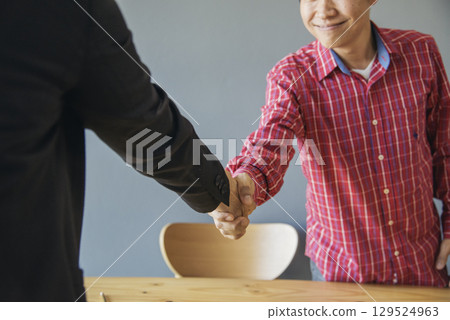 Banner Trust honesty business customer handshake together promise partner. Panorama Businessman teamwork diversity solidarity team Partner hands together. Team meeting shaking hands with copy space 129524963
