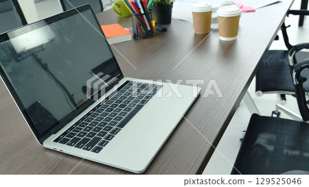 Banner Office laptop business financial document chart and graph on office wooden table coffee cup. Panorama Flat lay notebook computer laptop on office desk. Business stuff mockup with copy space 129525046