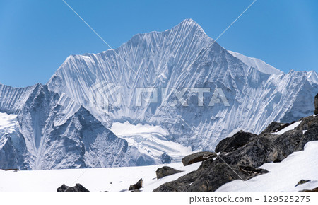 Beautiful view of Mt.Gangchempo (6,387 m) seen from Tsergo Ri (4,990m) the high point on the Langtang valley trek of Nepal. lies in Langtang region and has been perceived as best destination of Nepal. Beautiful view of Mt.Gangchempo (6,387 m) seen from Tsergo Ri (4,990m) the high point on the Langtang valley trek of Nepal. lies in Langtang region and has been perceived as best destination of Nepal. 129525275