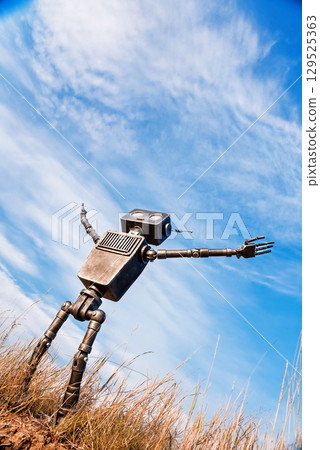 Concept of technology development in the form of artificial intelligence in a robot lives and feels, looking into the sky. 129525363