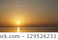 Enjoy the sunrise from the beach 129526231