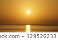 Dawn, golden sea, sky and morning sun 129526233