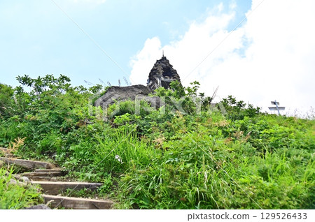 Looking up at Jizo Cairn 129526433