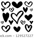 collection of hand drawn black heart shapes in various sizes, isolated on a white background. 129527227