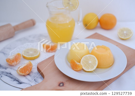 Homemade Citrus Pudding with Lemonade in Background Homemade Citrus Pudding with Lemonade in Background 129527739