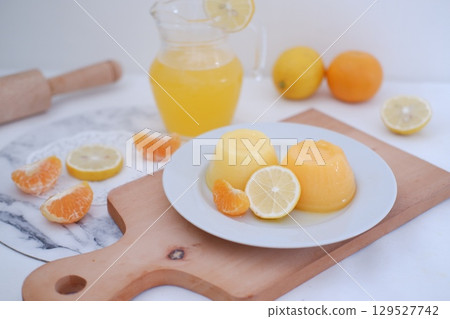Homemade Citrus Pudding with Lemonade in Background Homemade Citrus Pudding with Lemonade in Background 129527742