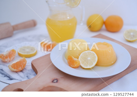 Homemade Citrus Pudding with Lemonade in Background 129527744