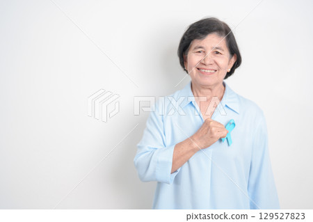 Elderly with blue Ribbon for concept of blue November, November Prostate Cancer Awareness month, World Diabetes day , Men Health month, International men, Father day. Healthcare and world cancer day 129527823