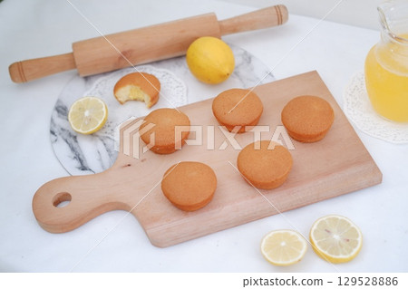 Soft Lemon Sponge Muffins with Fresh Lemonade 129528886