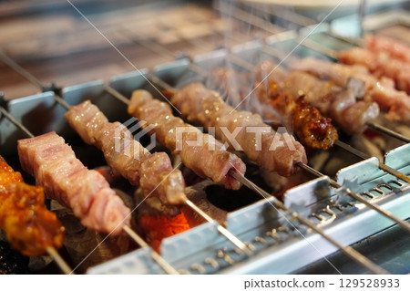 Grilled Skewers on Charcoal Grill 129528933