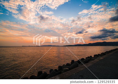 Sunset over the sea 129529335