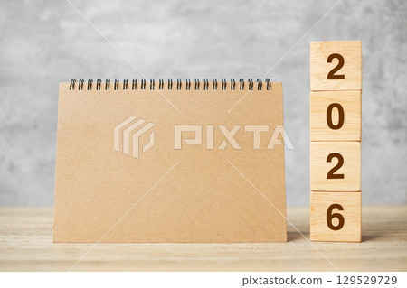 2026 Happy New Year with blank notebook and wooden number. countdown, Resolution, Goals, Plan, Action and Mission Concept 2026 Happy New Year with blank notebook and wooden number. countdown, Resolution, Goals, Plan, Action and Mission Concept 129529729