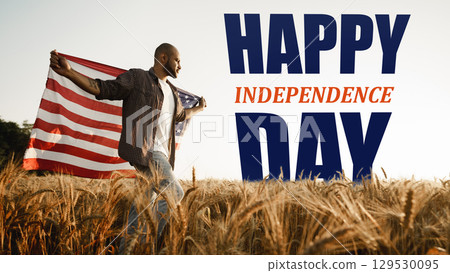 Celebrating Independence Day with joy in a wheat field during summer 129530095