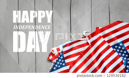 Joyful Independence Day celebration with American flags and festive decorations on wooden background Joyful Independence Day celebration with American flags and festive decorations on wooden background 129530182
