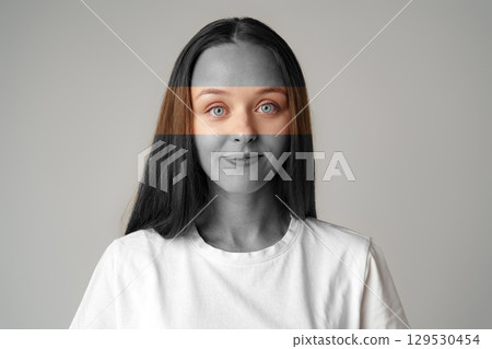 Portrait of a woman with unique eye concept and monochromatic background in a creative art setting Portrait of a woman with unique eye concept and monochromatic background in a creative art setting 129530454
