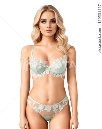 A dreamy bridal lingerie set in soft cream, blending lace and organza for a smoky effect. The balconette bra features 129531327