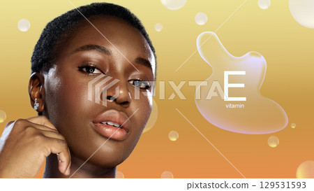 Captivating woman with short hair showcasing skin benefits of vitamin E against a vibrant background Captivating woman with short hair showcasing skin benefits of vitamin E against a vibrant background 129531593