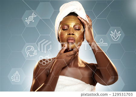 Woman applying gold facial mask at home spa in the evening for skin rejuvenation and relaxation Woman applying gold facial mask at home spa in the evening for skin rejuvenation and relaxation 129531703