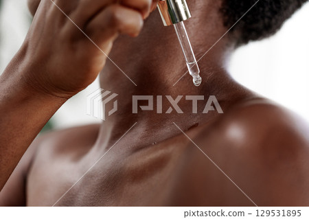 Skin care routine featuring serum application to enhance hydration and rejuvenation at home during daytime 129531895