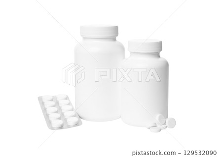 Two bottles next to a strip of pills, isolated on white, PNG Two bottles next to a strip of pills, isolated on white, PNG 129532090