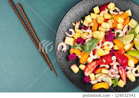 shrimp salad featuring tropical fruits. shrimp salad featuring tropical fruits. 129532541