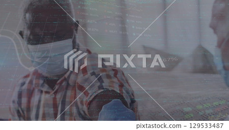 Image of data processing over caucasian male doctor with patient 129533487