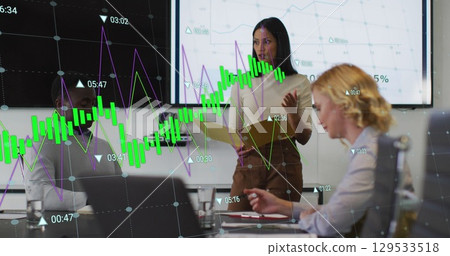 Image of data processing over diverse business people at meeting 129533518