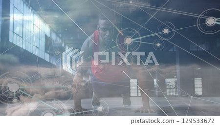 Image of data processing over african american man doing push ups 129533672