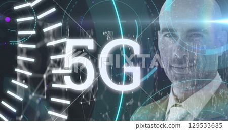 Image of network of connections and globe over man wearing vr headset 129533685