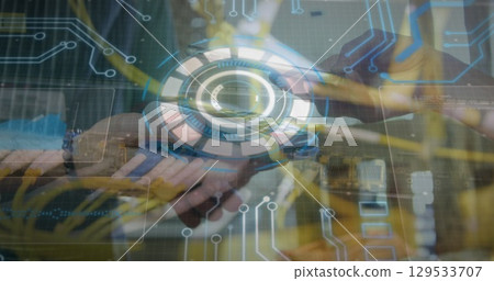 Image of processing circle over hands of caucasian people using payment terminal 129533707