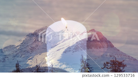 Image of candle over mountains landscape Image of candle over mountains landscape 129533716