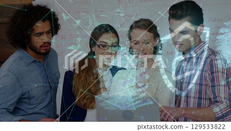 Image of globe of connections over diverse business people using tablets 129533822