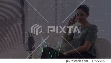 Image of data processing and graphs over caucasian woman having call on smartphone 129533898