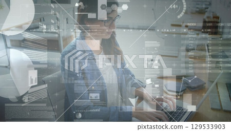 Image of financial data processing over businesswomen using laptop Image of financial data processing over businesswomen using laptop 129533903